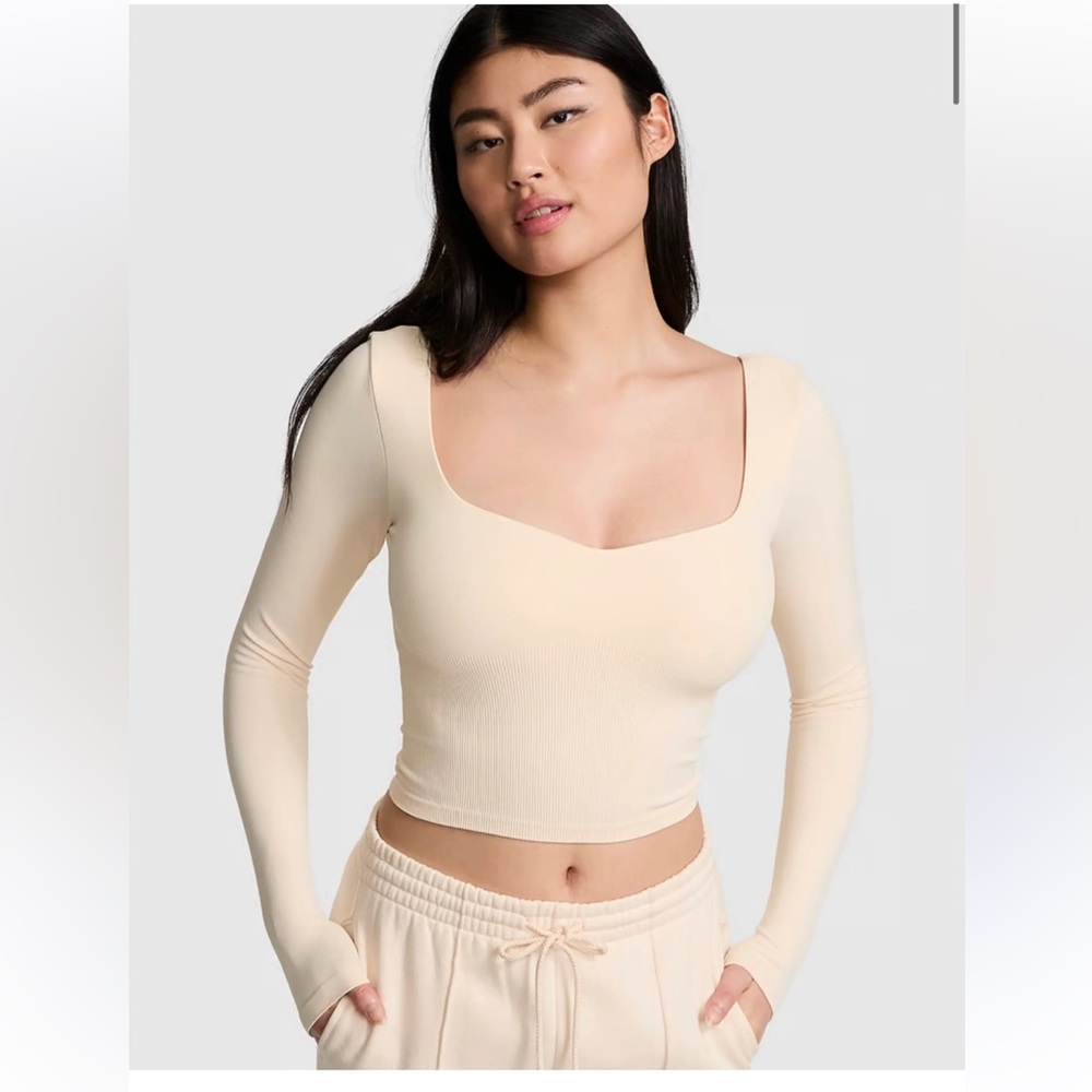 VS PINK Women’s Soft Seamless Notched Long Sleeve Top white Shell color.
